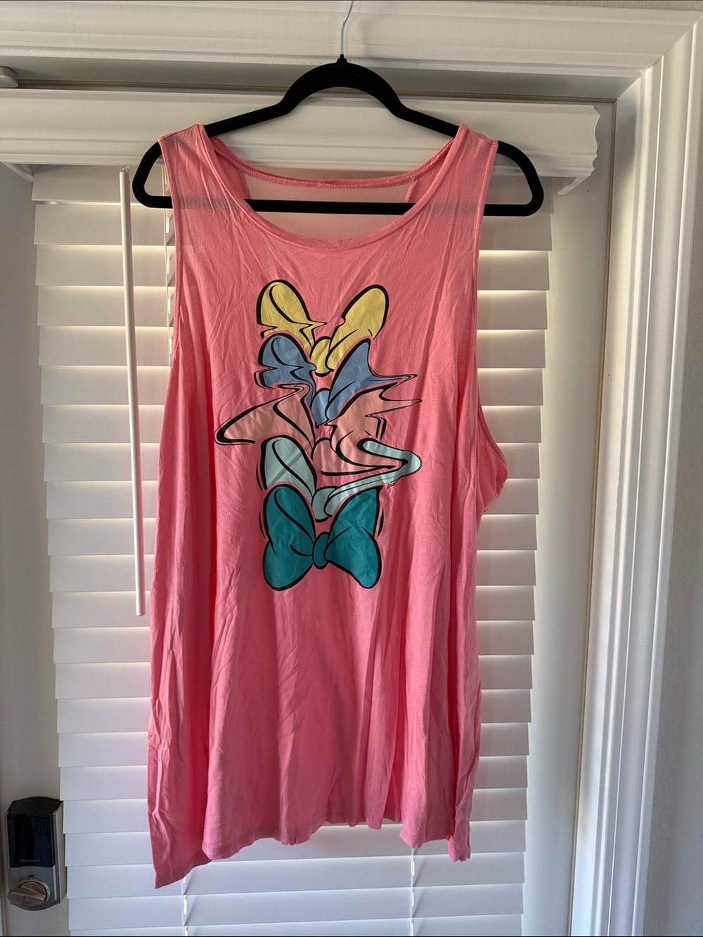 Pink Graphic Tank Top with Colorful Bow Design